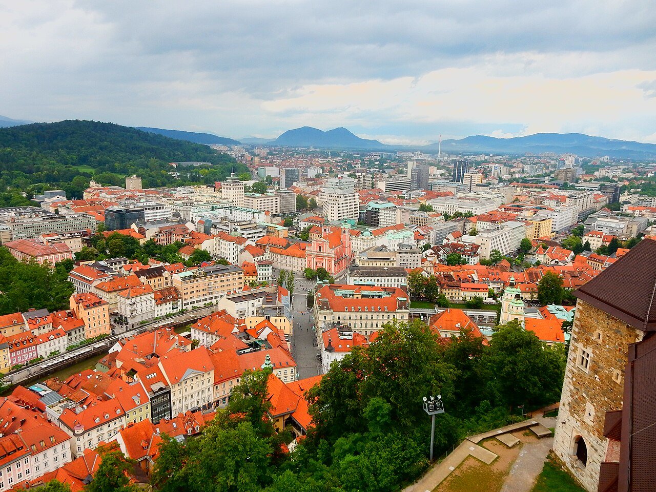 Ljubljana's riverside old town with bridges, colourful buildings and castle hill