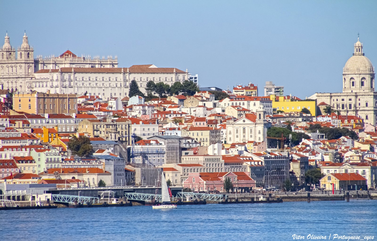 Lisbon rooftops and hillside neighbourhoods overlooking the Tagus River