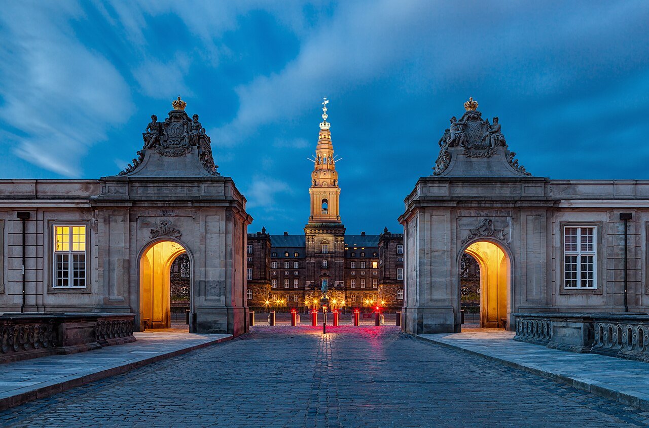Christiansborg Palace beside Copenhagen's waterfront and city streets